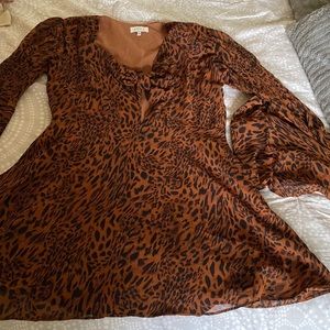 Long flowy cheetah print dress.